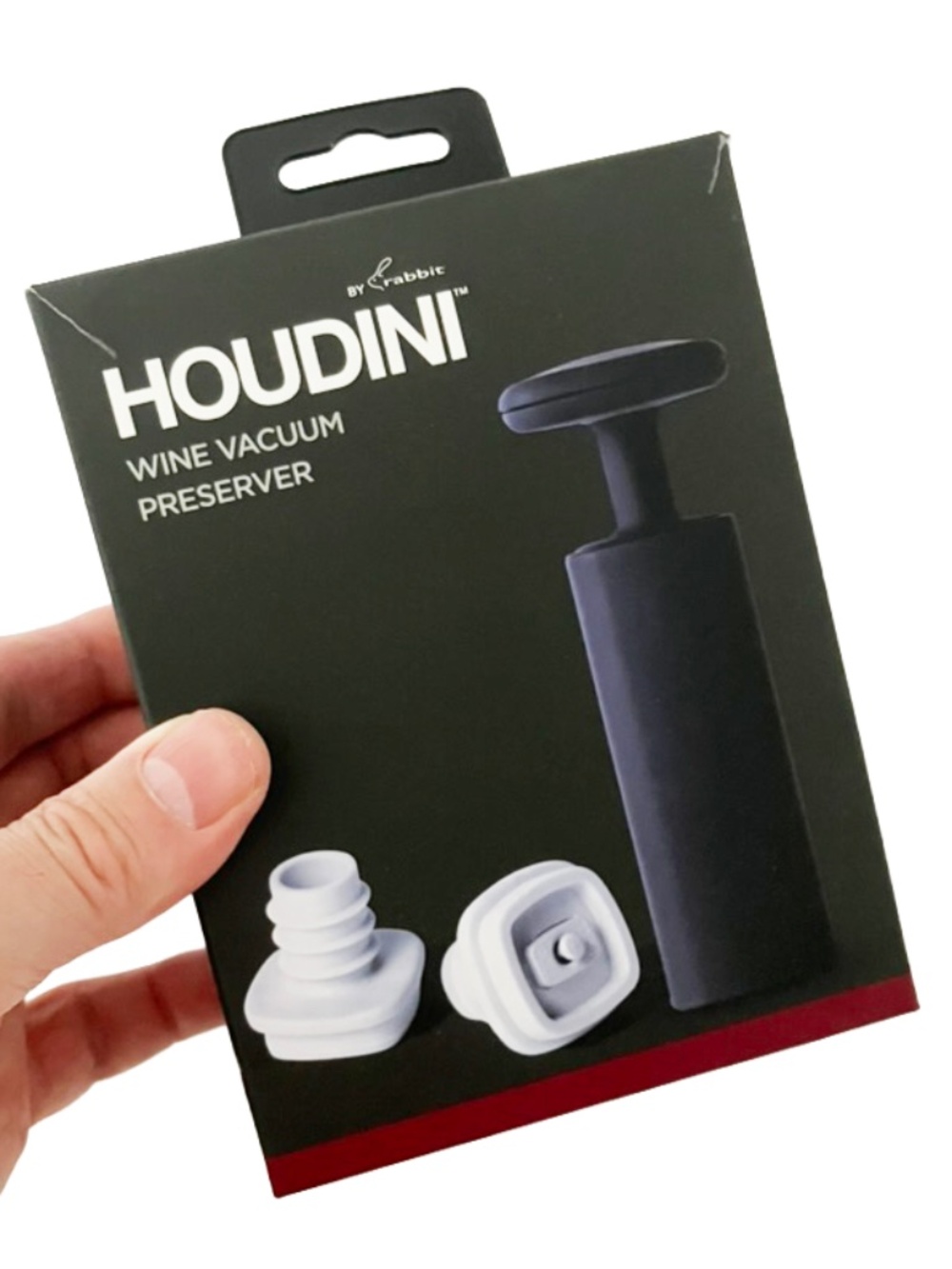 Houdini Wine Vacuum Preserver featuring a black hand pump and two grey stoppers